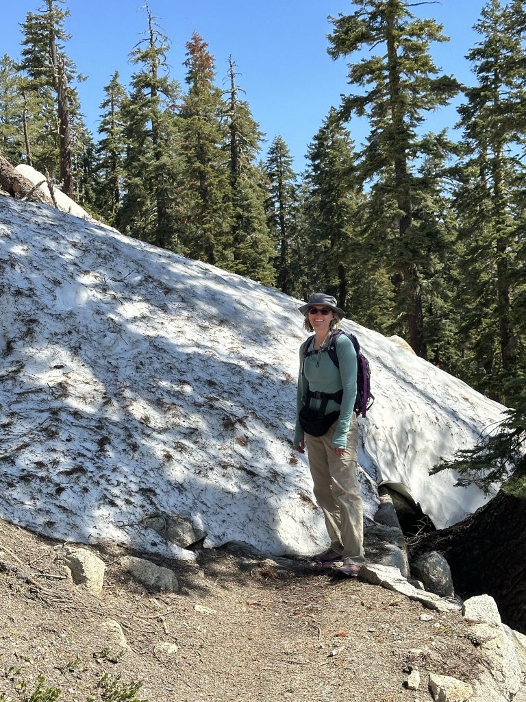 Standing next to a snow mound obstacle on the Tahoe Rim Trail