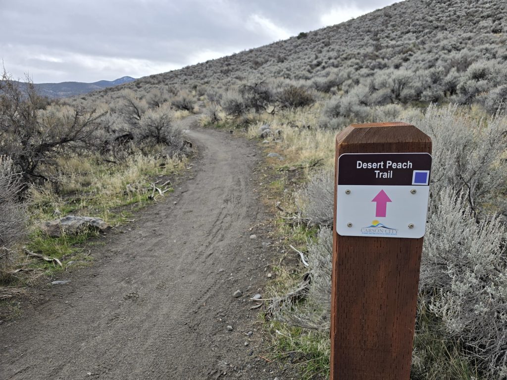 Desert Peach trail sign on Prison Hill