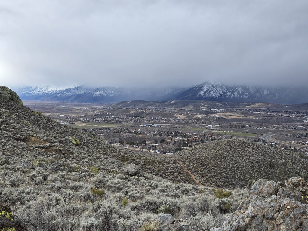 Storm clouds hanging over the Carson Range during winter hiking in Carson City