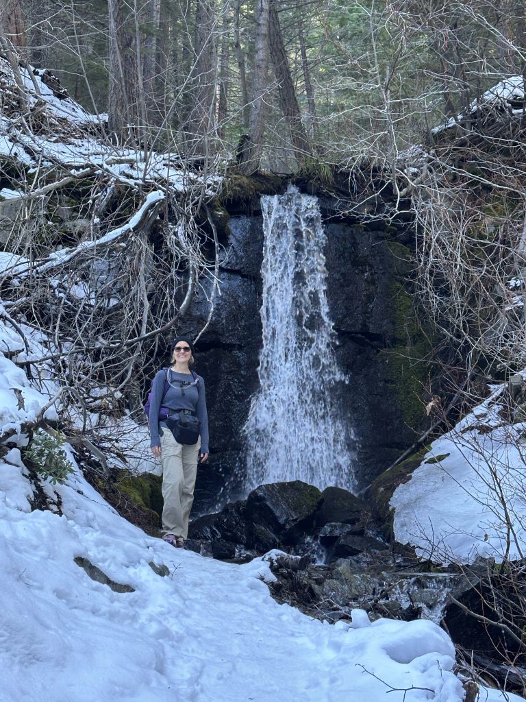 Standing at Genoa Falls in winter
