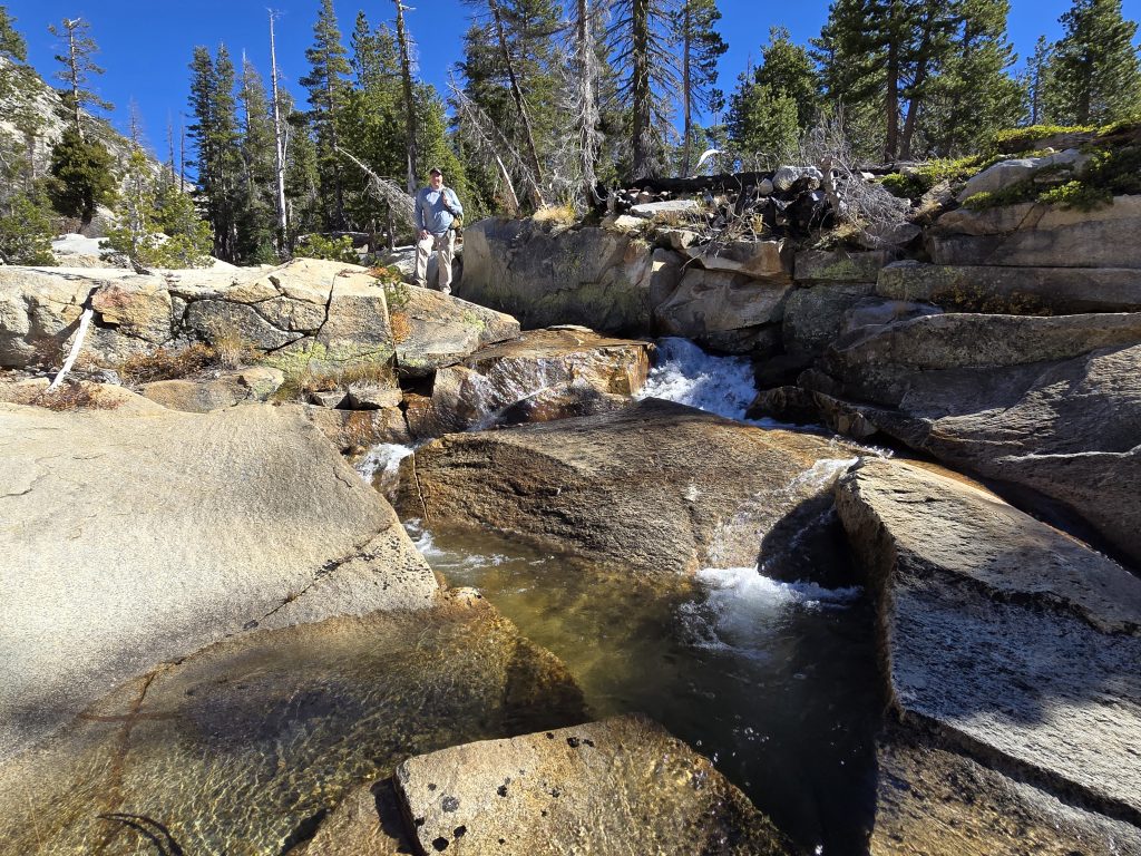 Hiking on boulders up Lyons Creek