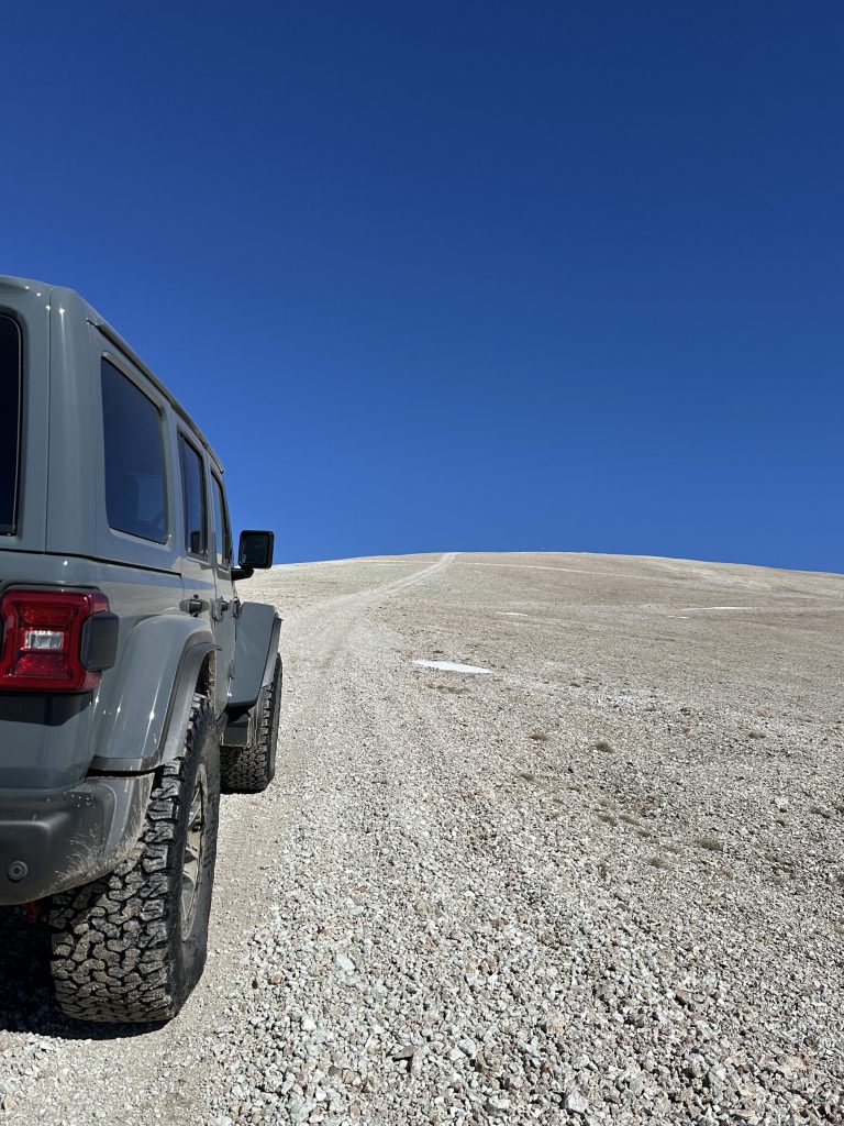 Jeep ascending to the top of Mt. Patterson