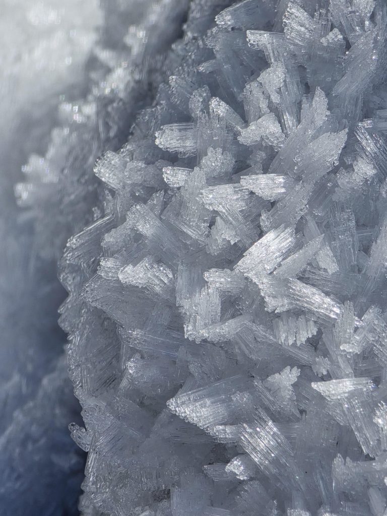 A close-up of rime frost, a type of snow crystal