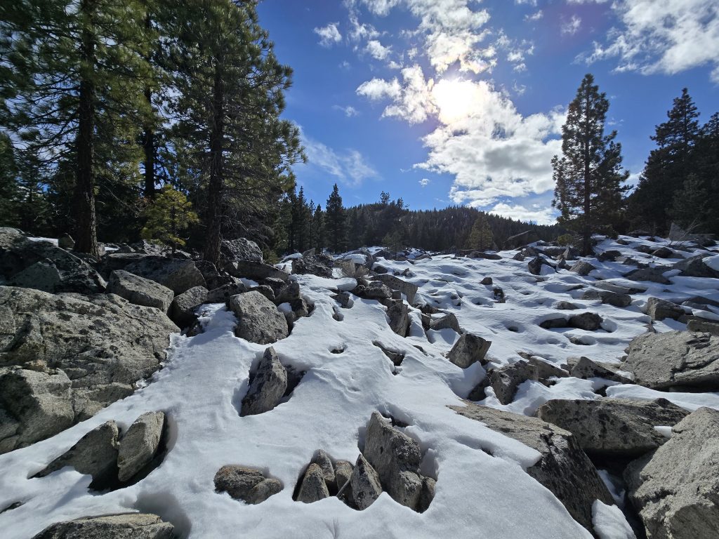 Snow-covered boulders near Rock Lake on Ophir Creek Trail
