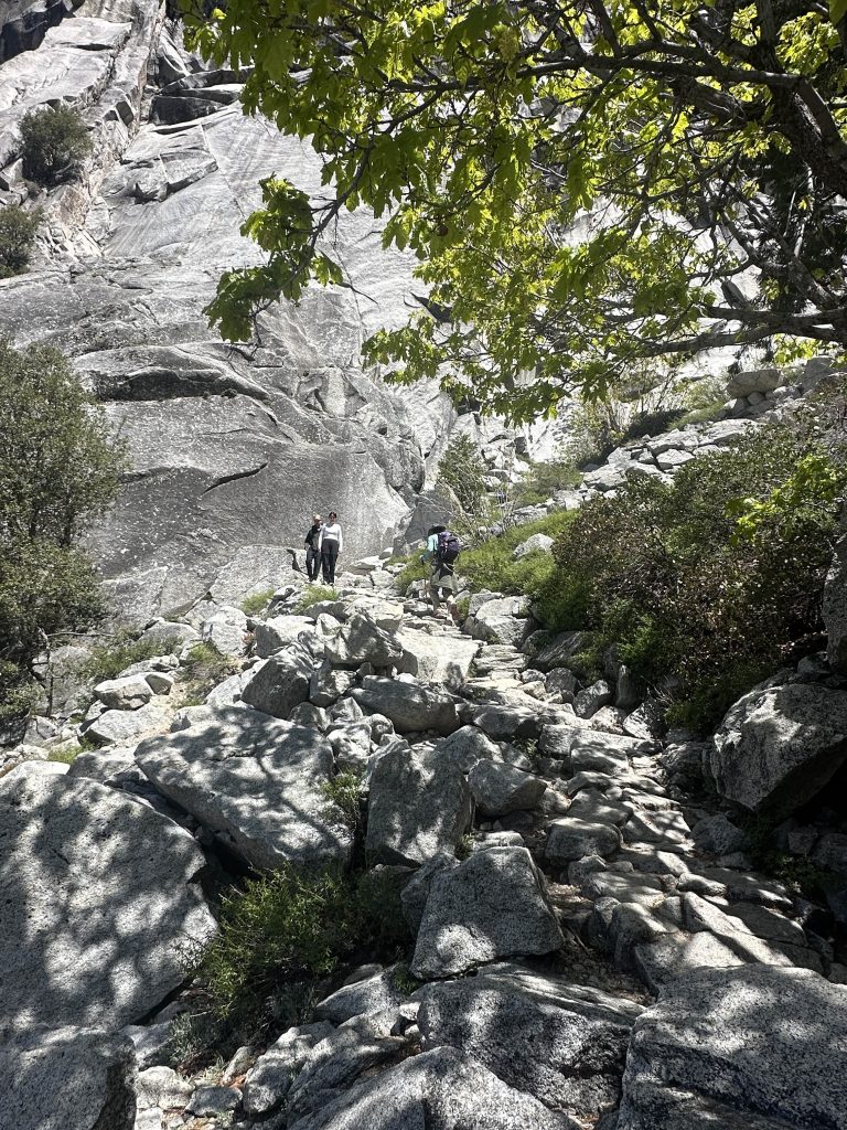 Ascending stone steps on the trail to the top of Nevada Falls in Yosemite