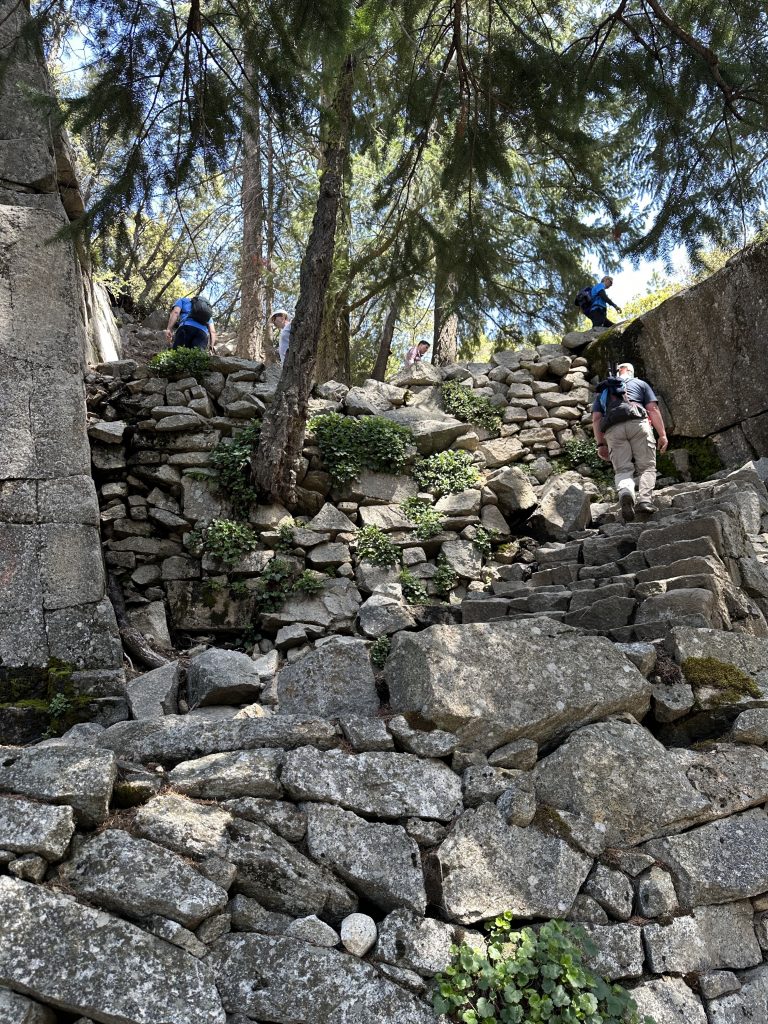 Climbing a series of stone mini-switchbacks en route to the top of Nevada Falls in Yosemite