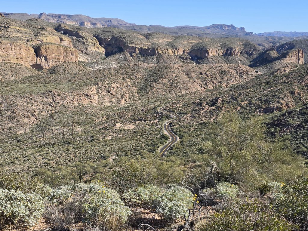 A view of Apache Trail Highway 88 winding through the desert from Boulder Canyon hike trail