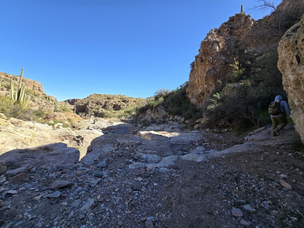 Crossing one of the rocky washes on the Picketpost Mountain Loop hike in Arizona