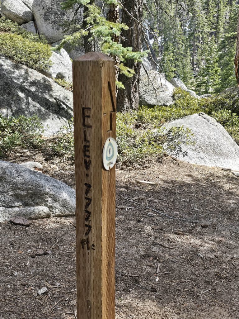 Signpost for elevation 7,777 feet